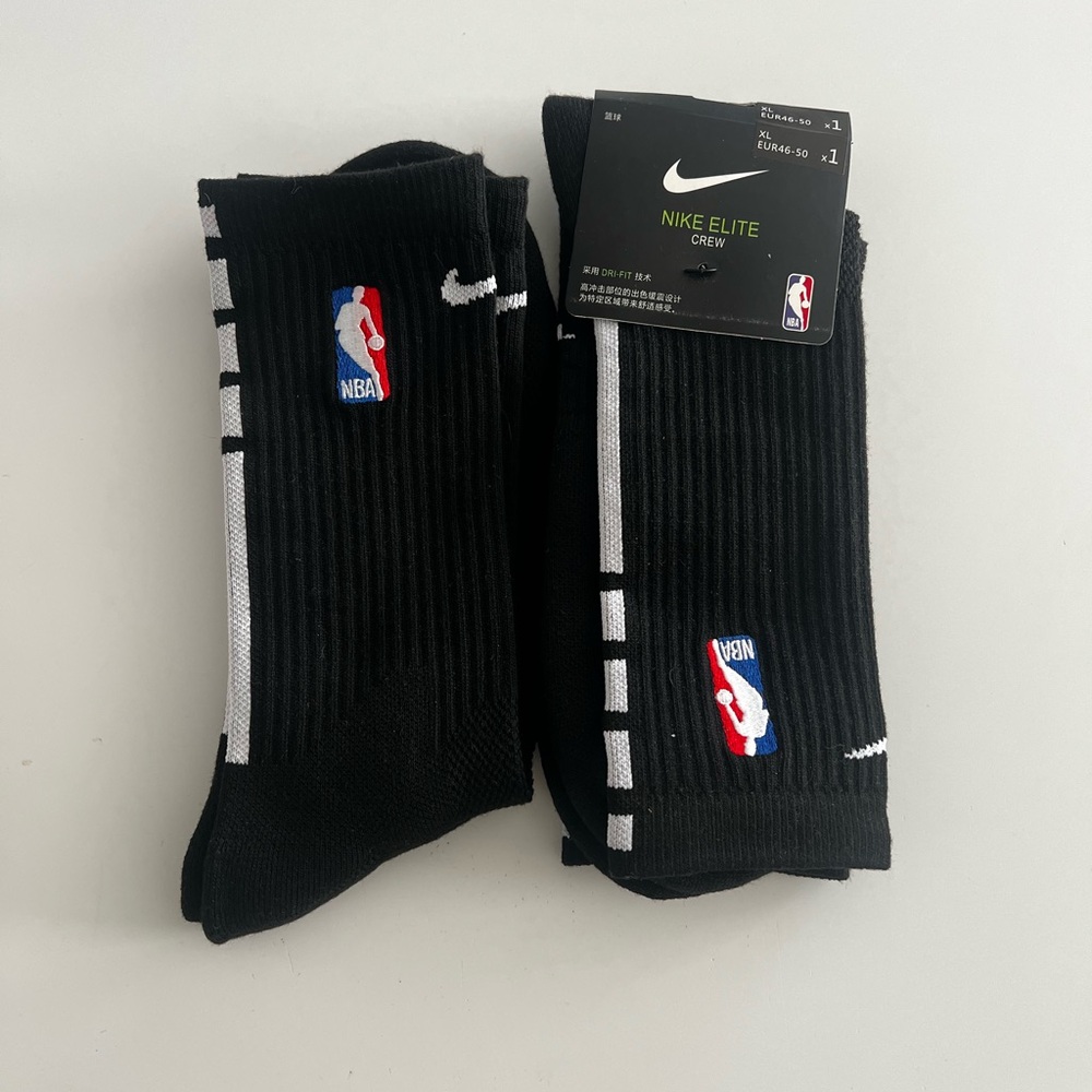 Two sets of Nike Elite Crew Black and White Athletic Socks